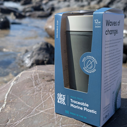 recycled plastic Reusable Coffee Cup 12oz on the beach