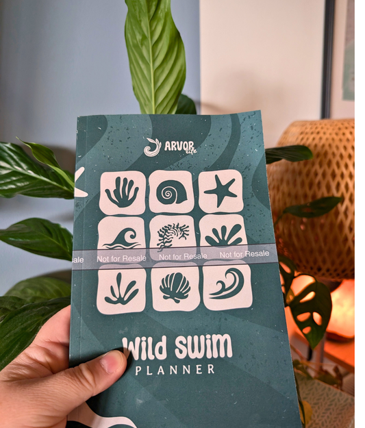 A green 'Wild Swim Planner' by Arvor Life with imagery of wild swimming symbols