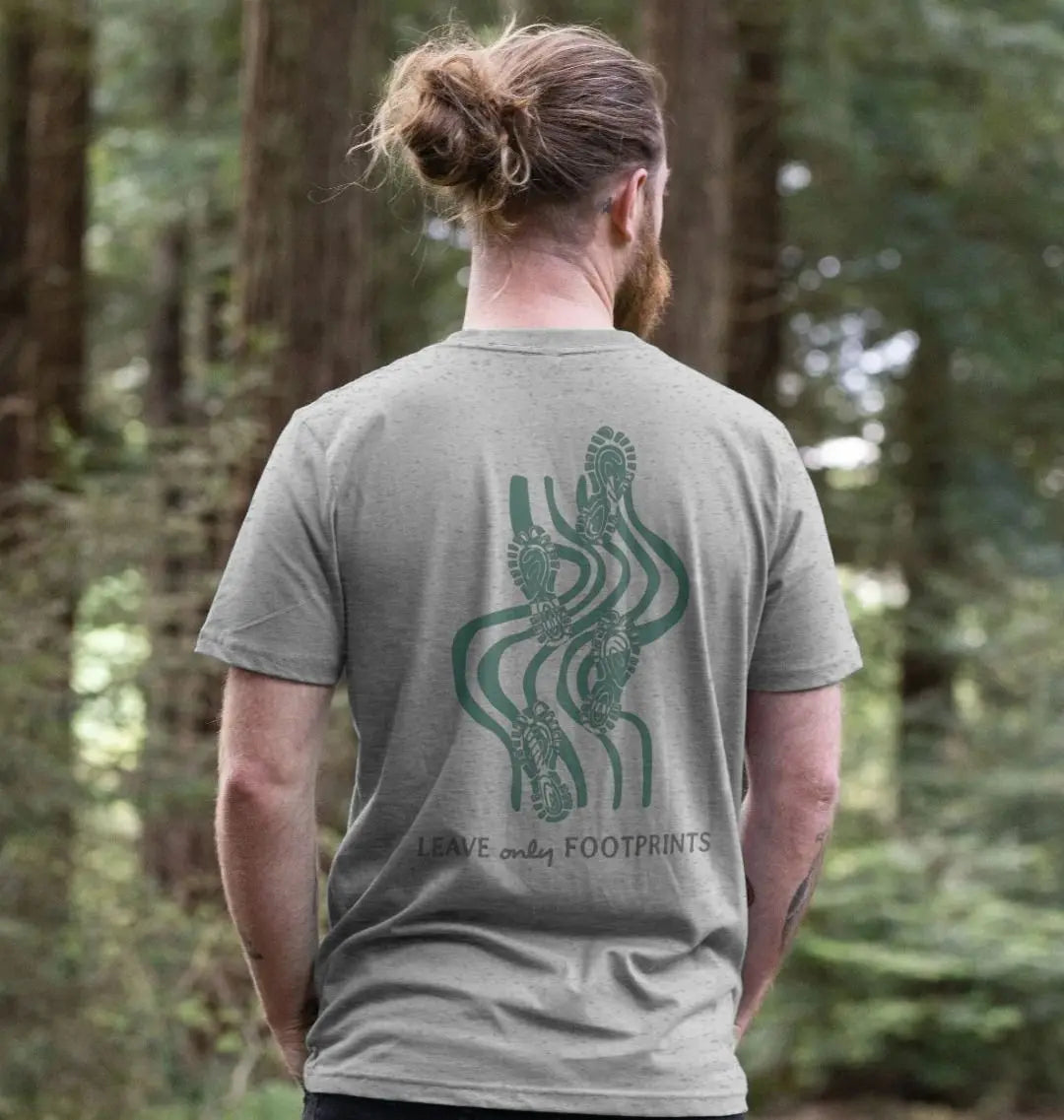 Eco-friendly men’s hiking t-shirt featuring footprints on a trail design