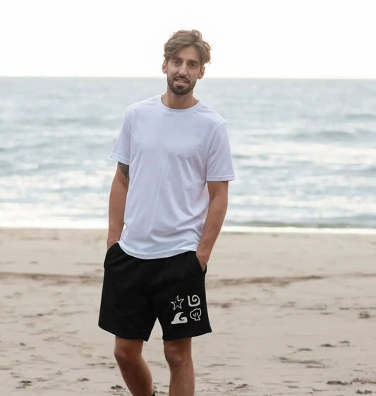 Shoreline Eco-friendly men’s shorts with coastal shell and starfish artwork in black