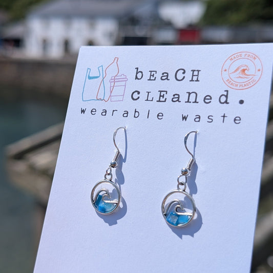 Beach waste sterling silver wave earrings made with plastic collected from our beaches. 