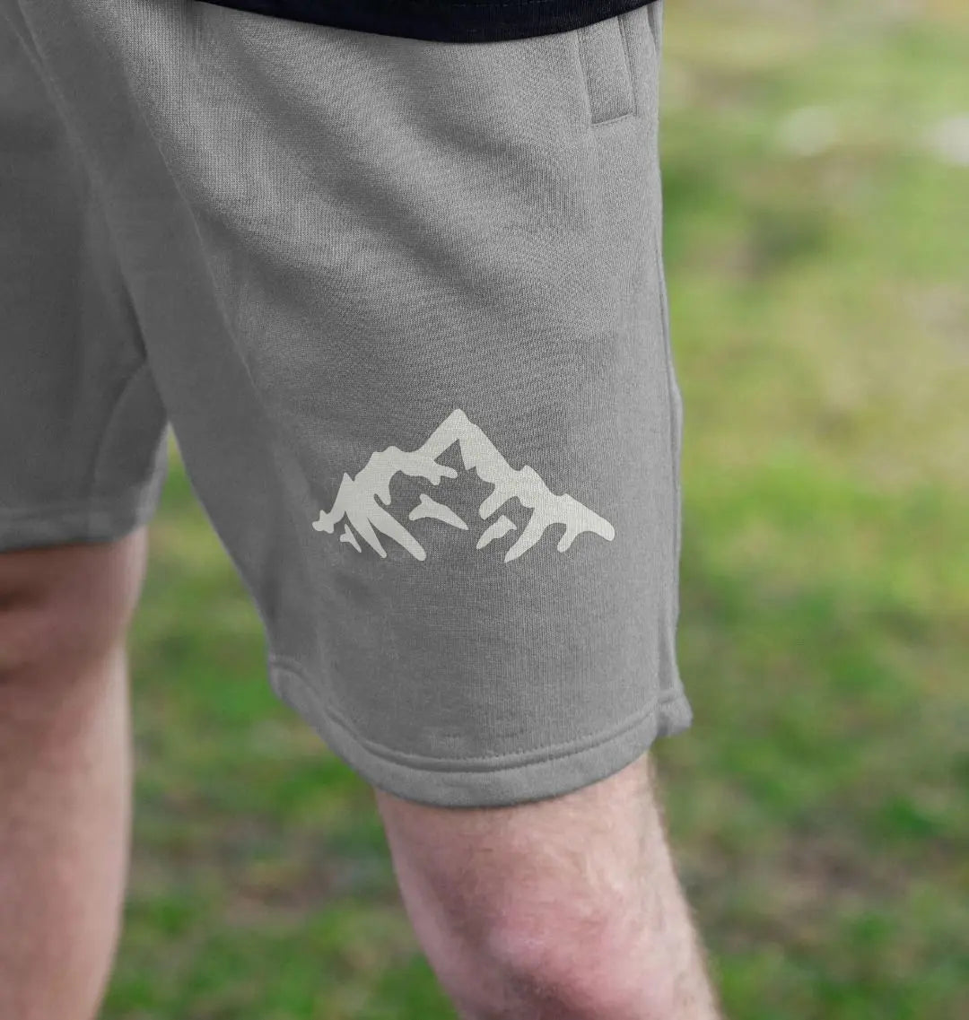 The Peaks grey men’s jogger shorts with mountain peak design on front 