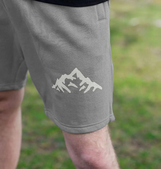 The Peaks grey men’s jogger shorts with mountain peak design on front 