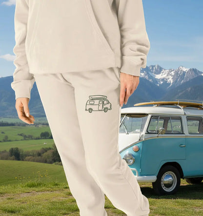 Woman wearing Van Babe Jogging Bottoms organic cotton fleece-lined joggers in oat for van life and travel adventures
