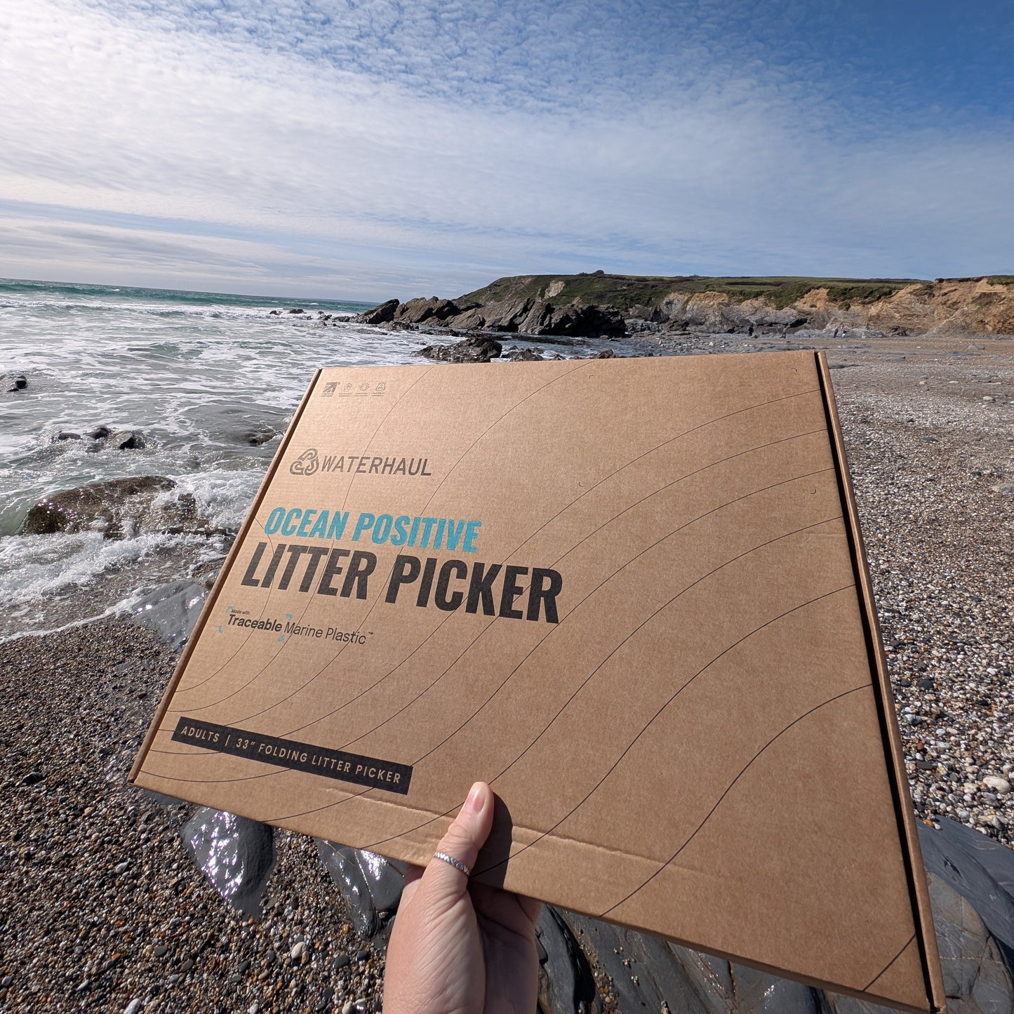 marine waste litter picker on a beach 