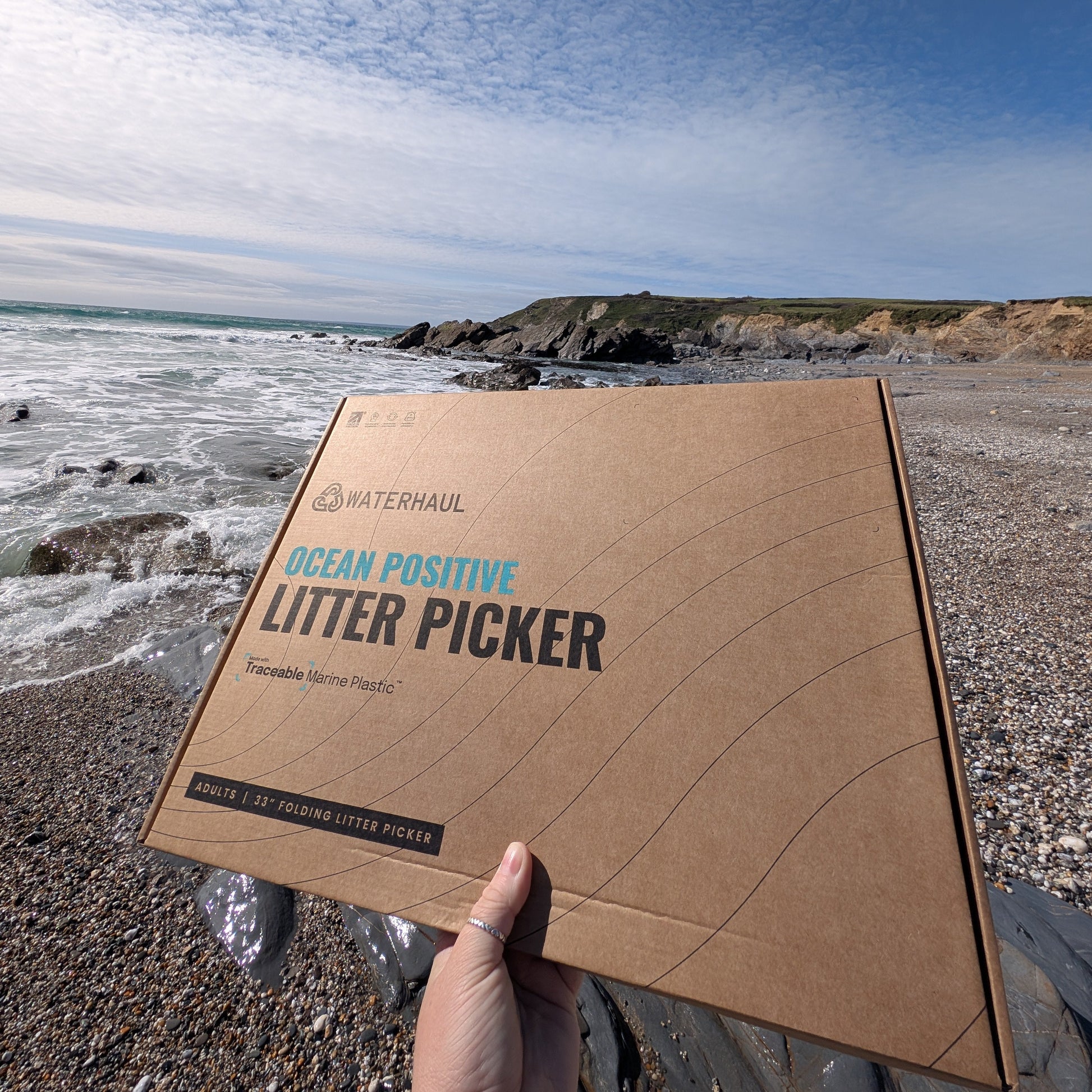 marine waste litter picker on a beach 