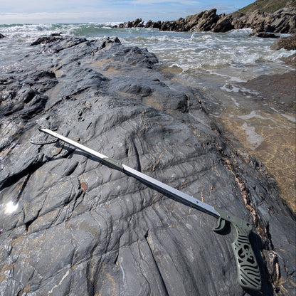 recycled ghost net litter picker on a beach 